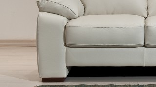 White Elegant Leather Sofa Set with Throw Pillows