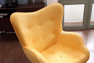 Cozy Yellow Fabric Chair with Ottoman