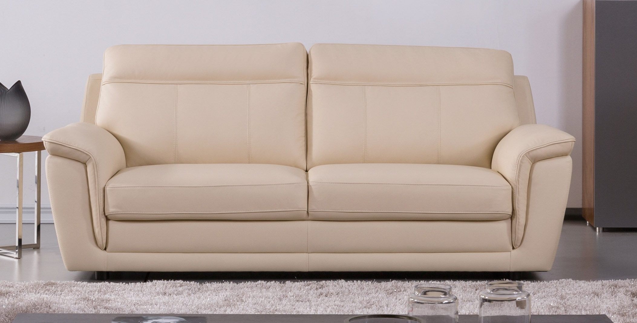 beige leather and wood sofa